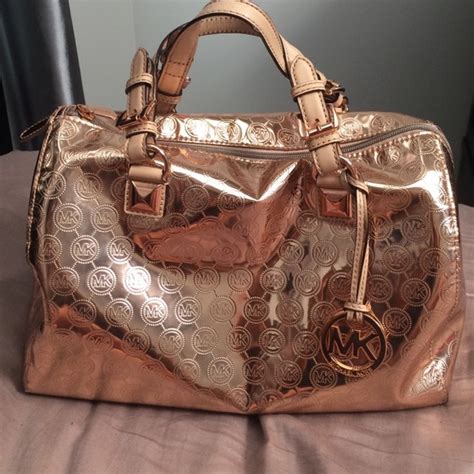 michael kors rose gold purse with flowers|michael kors gold evening bag.